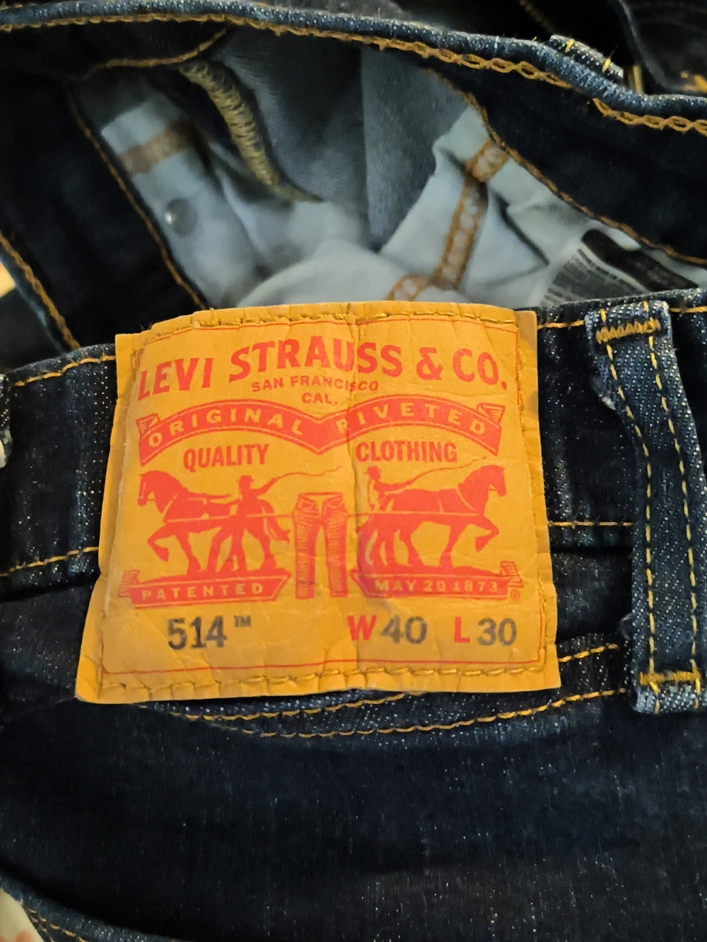 Levi's 514 Slim Straight Jeans in Dark Blue with Orange Patch